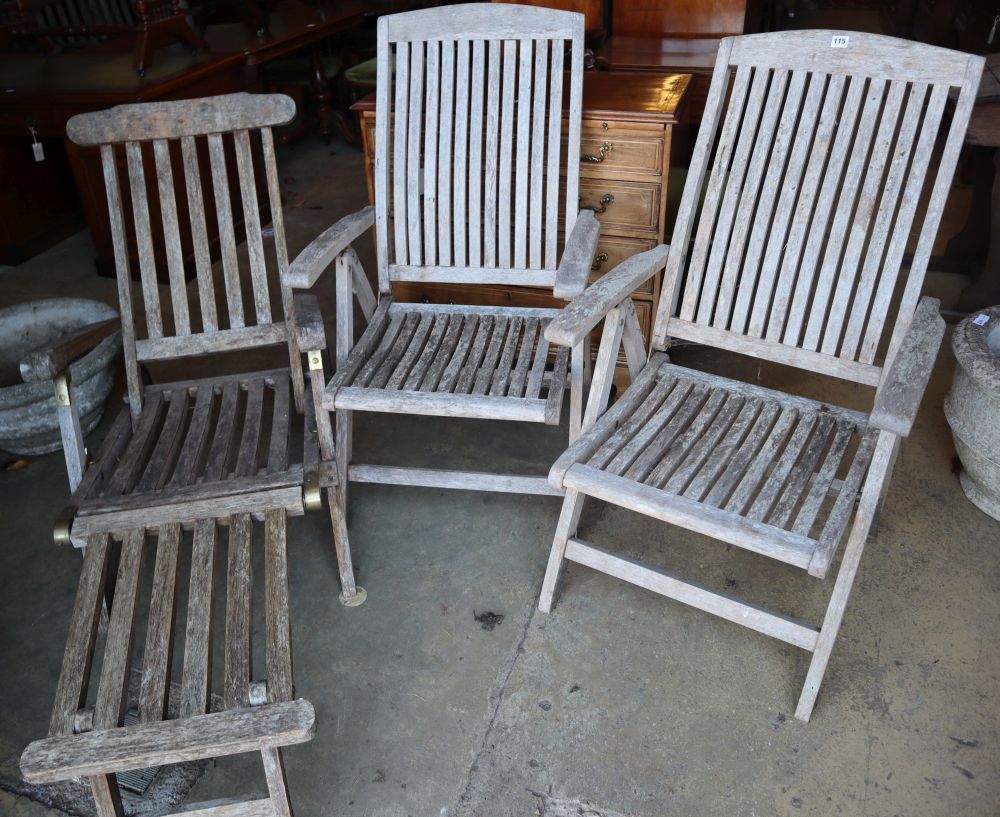 A pair of weathered teak folding garden chairs and a similar steamer chair